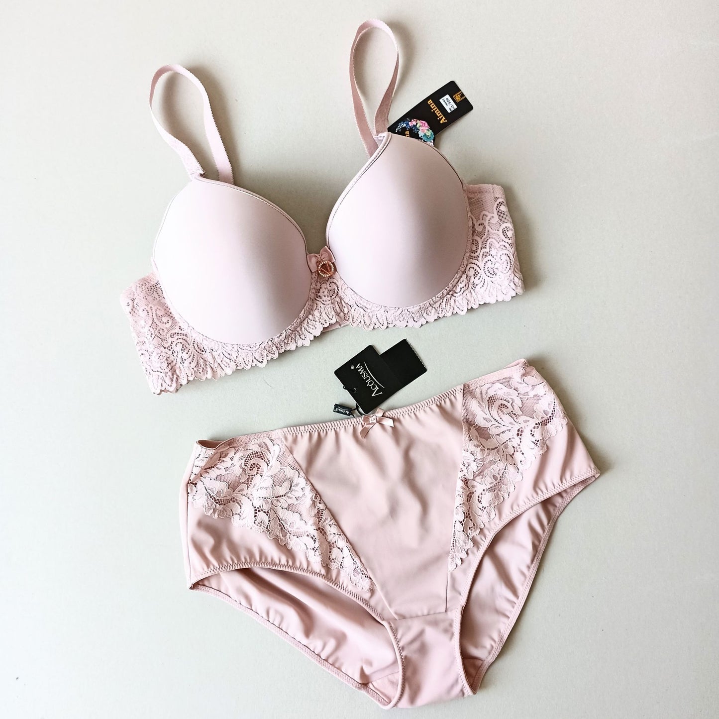 Lygi liemenėlė su push-up ir kelnaitės, pudros rausva (90-100D/M-XXL)
